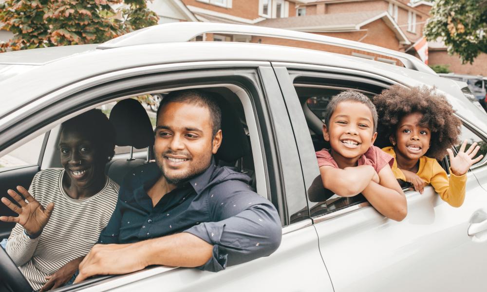 Family driving in car.